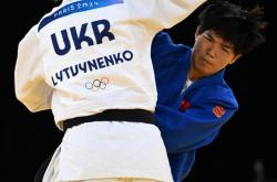 爱游戏体育官网-加拿大选手在柔道比赛中大放异彩，取得胜利的简单介绍